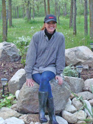 Michele sitting by pond adjusted